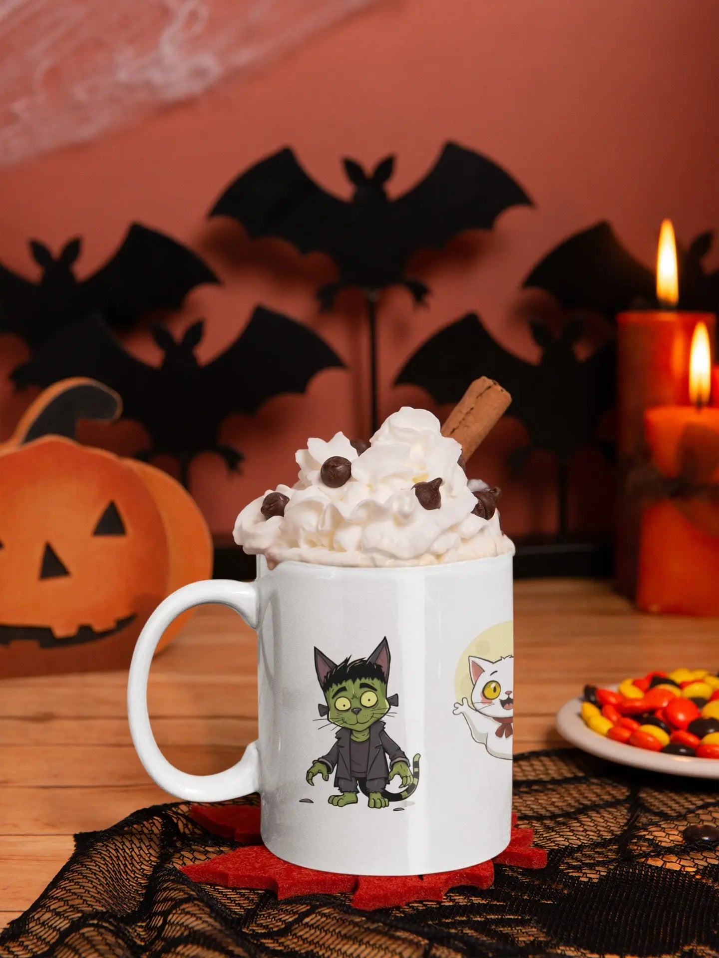 Spooky coffee mug featuring cat versions of universal monsters